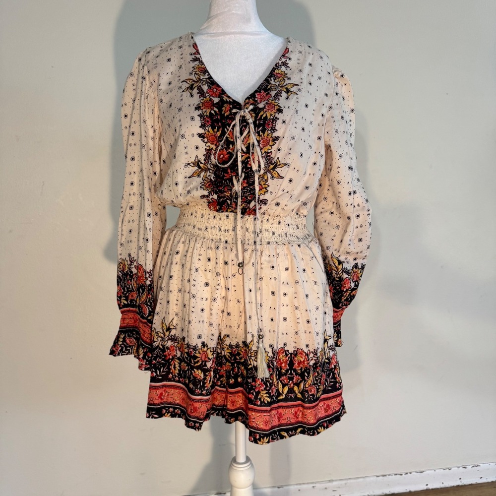 Angie Bohemian Floral Smocked Waist Lace Up Romper Cream Long Sleeve Medium